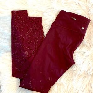Lululemon leggings burgundy with velvet pattern down legs.
